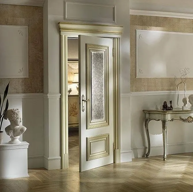 White Classic Glazed Door – Gold-Trimmed Casing, Patterned Glass